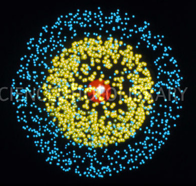 Computer graphics representation of the electronic structure of lithium, a Group I metal in the Periodic Table of the Elements. The nucleus of this lithium atom is shown in red. The yellow "cloud" represents the 1s electron orbital, with the outer 2s cloud coloured blue. The image hightlights the three- dimensional nature of the electronic orbitals around the nucleus. Lithium has an atomic number of 3 (after hydrogen, 1 & helium,2), with 2 electrons filling its 1s orbital and 1 electron in the 2s orbital.